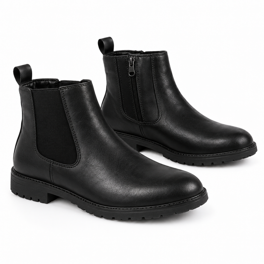 A pair of black leather Chelsea boots with elastic side panels and rear pull tabs, shown on a clean white background.