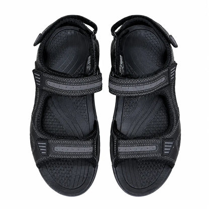A pair of black athletic sandals with hook-and-loop straps, shown from a top-down view on a white background.