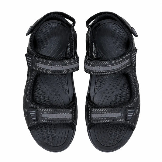 A pair of black athletic sandals with hook-and-loop straps, shown from a top-down view on a white background.
